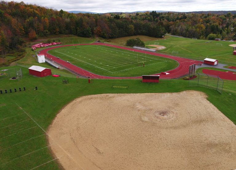 in foreground, baseball field, background is track and football field.